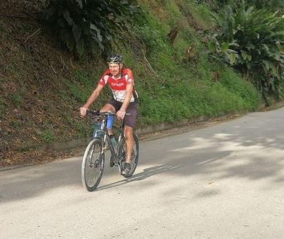 James Raddatz Cycling on the  tour with redspokes